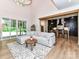 Bright open floor plan with an informal living area, hardwood floors, and sliding glass doors to the outside at 167 Greenbay Rd, Mooresville, NC 28117