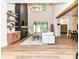 Bright living room with fireplace, high ceilings, modern furnishings, and access to the backyard at 167 Greenbay Rd, Mooresville, NC 28117