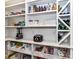 The pantry offers ample storage space with shelves and wine rack at 167 Greenbay Rd, Mooresville, NC 28117