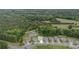 Gorgeous aerial view of a beautiful home nestled in a serene, tree-filled neighborhood at 1813 Shelbourne Way, Fort Mill, SC 29707