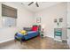Cozy bedroom with hardwood floors, soft lighting, and fun decor at 1813 Shelbourne Way, Fort Mill, SC 29707