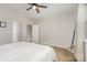 Bedroom featuring a ceiling fan and a view of the bedroom doors and mirror at 1813 Shelbourne Way, Fort Mill, SC 29707