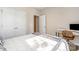 Bedroom featuring closet space, neutral walls, and a home office area at 1813 Shelbourne Way, Fort Mill, SC 29707