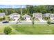 Aerial street view showcases well-maintained homes, manicured lawns, and tree-lined streets in the neighborhood at 1813 Shelbourne Way, Fort Mill, SC 29707