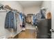 Walk-in closet with ample storage space for clothing, accessories and shoes at 1813 Shelbourne Way, Fort Mill, SC 29707
