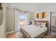 This bedroom features a neutral color scheme, modern decor, and lots of natural light at 2004 Waxhaw Crossing Dr, Waxhaw, NC 28173