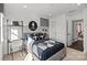Modern bedroom featuring stylish decor, a geometric color scheme, and contemporary furnishings at 2004 Waxhaw Crossing Dr, Waxhaw, NC 28173