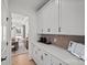 Walk-in pantry with ample storage space, sleek countertops, and modern fixtures at 2004 Waxhaw Crossing Dr, Waxhaw, NC 28173