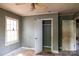 This bedroom features an closet and a window that provides natural lighting to the room at 208 N School St, Mount Gilead, NC 27306