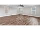 Bright and spacious bedroom with luxury vinyl floors, multiple windows, and neutral paint, creating a relaxing atmosphere at 2092 Fordhill St, Rock Hill, SC 29732