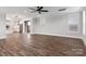 Spacious living area seamlessly connecting to the kitchen with luxury vinyl floors, recessed lights, and ample natural light at 2092 Fordhill St, Rock Hill, SC 29732
