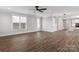 Bright open-plan living area with hardwood floors, recessed lighting, and large windows allowing ample natural light at 2092 Fordhill St, Rock Hill, SC 29732