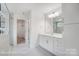 Modern bathroom with a spacious vanity, tile floors, glass shower door, and walk-in closet at 2233 Tabor Rd # 586, Sherrills Ford, NC 28673