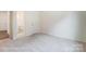 Carpeted bedroom with access to a bathroom at 2233 Tabor Rd # 586, Sherrills Ford, NC 28673