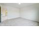 Bright bedroom with neutral carpet and paint, adjacent to other rooms at 2233 Tabor Rd # 586, Sherrills Ford, NC 28673