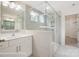 Luxurious bathroom featuring tiled shower, glass enclosure, a vanity, and bright lighting at 2233 Tabor Rd # 586, Sherrills Ford, NC 28673