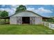 Well-maintained barn featuring a sturdy structure, open doors, and a spacious interior at 2448 Moss Farm Rd, Hickory, NC 28602