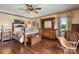 Comfortable bedroom with hardwood floors, a ceiling fan, and traditional wood furniture at 2448 Moss Farm Rd, Hickory, NC 28602