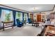 Inviting living room with carpet, traditional décor, chandelier, and large window with lots of natural light at 2448 Moss Farm Rd, Hickory, NC 28602