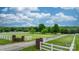 Expansive green pastures, white fencing, and mature trees create a serene and picturesque setting at 2448 Moss Farm Rd, Hickory, NC 28602