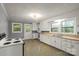 Bright kitchen featuring classic cabinetry, and a view of the backyard at 24515 Saint Martin Rd, Albemarle, NC 28001
