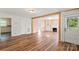 Spacious living room with hardwood floors, open floor plan, and fireplace at 24515 Saint Martin Rd, Albemarle, NC 28001