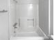Modern bathroom features a pristine white tub and contemporary fixtures at 2532 Steeplechase Rd, Gastonia, NC 28056