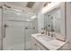 Updated bathroom with a glass-enclosed shower, marble vanity, and modern fixtures at 2702 Oxborough Dr, Matthews, NC 28105