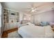 Bright bedroom with built-in shelves and cabinets and a plush white rug at 2702 Oxborough Dr, Matthews, NC 28105