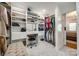 Spacious walk-in closet with custom shelving, drawers, and ample hanging space at 2702 Oxborough Dr, Matthews, NC 28105