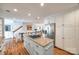 Charming kitchen with a granite-topped island and stainless steel refrigerator at 2702 Oxborough Dr, Matthews, NC 28105