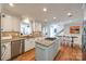 Stylish kitchen with stainless steel appliances and a center island with a gas cooktop at 2702 Oxborough Dr, Matthews, NC 28105