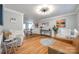 Spacious living area showcasing hardwood floors, stylish furniture, and an open layout for versatile use at 2702 Oxborough Dr, Matthews, NC 28105