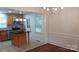 Kitchen and dining nook combination with stainless steel appliances and an island at 2716 Rea Rd, Charlotte, NC 28226