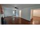 Spacious living room featuring hardwood floors and entryways to other rooms at 2716 Rea Rd, Charlotte, NC 28226