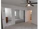 Spacious main bedroom with a ceiling fan, closet with mirrored doors and en suite bathroom at 2716 Rea Rd, Charlotte, NC 28226