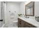 Bathroom with modern vanity and shower and tub combo at 2968 Grace St, Claremont, NC 28610