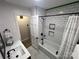 Updated bathroom with white subway tile surround, black fixtures, and decorative black grout at 2968 Grace St, Claremont, NC 28610