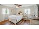 Charming bedroom features a ceiling fan and wood flooring at 2968 Grace St, Claremont, NC 28610