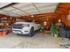 Garage with storage and truck parked inside at 2968 Grace St, Claremont, NC 28610