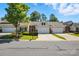 Charming home featuring a three-car garage, well-maintained landscaping, and a welcoming entrance at 31415 Royal Tern Ln, Fort Mill, SC 29707