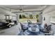 A look into the garage space with a table, chairs, and a golf cart at 31415 Royal Tern Ln, Fort Mill, SC 29707