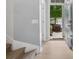 Bright entryway with hardwood floors and view of the front yard at 3306 Yarmouth Ln, Gastonia, NC 28056