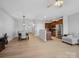 Open concept living and dining area featuring hardwood floors and stainless steel appliances at 3306 Yarmouth Ln, Gastonia, NC 28056