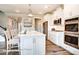 Well-equipped kitchen boasting an island with seating, stainless steel appliances, and ample cabinet space at 3315 Whispering Creek Dr # 95, Wesley Chapel, NC 28079