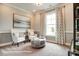 Cozy living room featuring neutral tones, comfortable seating, and ample natural light at 3315 Whispering Creek Dr # 95, Wesley Chapel, NC 28079