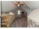 Bedroom featuring a small bed, toys, a ceiling fan, and a window at 3409 Valdosta Ct, Monroe, NC 28110