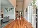 Bright foyer boasts hardwood floors, soaring ceiling, and decorative wall accents at 3409 Valdosta Ct, Monroe, NC 28110