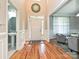 Elegant foyer showcases hardwood flooring, wainscoting, and a modern half bath at 3409 Valdosta Ct, Monroe, NC 28110