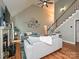 Features hardwood floors, high ceilings, a ceiling fan, and a fireplace at 3409 Valdosta Ct, Monroe, NC 28110